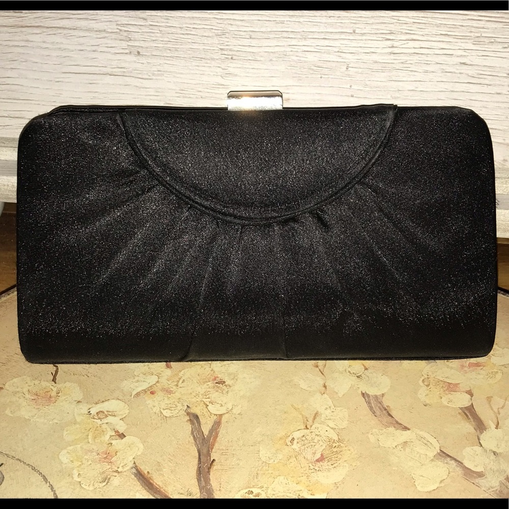 Black clutch with thin chain strap